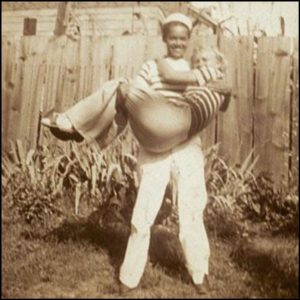 Pauli Murray Carrying Peggie. 1937.